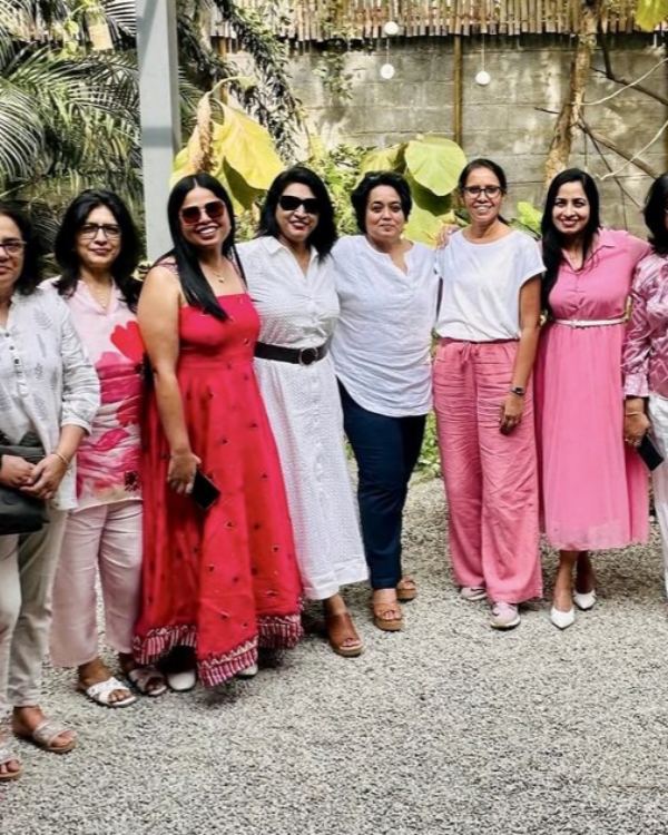 WOW Club members gathered around a table in Bangalore